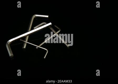 Allen keys with plain black background Stock Photo