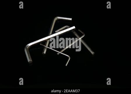 Allen keys with plain black background Stock Photo