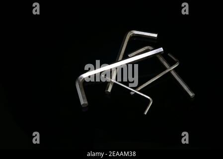 Allen keys with plain black background Stock Photo