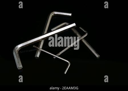 Allen keys with plain black background Stock Photo