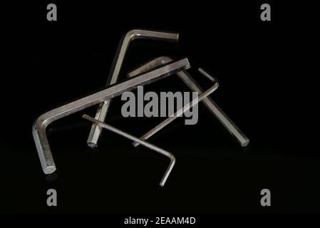 Allen keys with plain black background Stock Photo