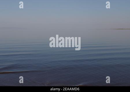 Dramatic calm dark sea before storm, natural photo background. Stock Photo