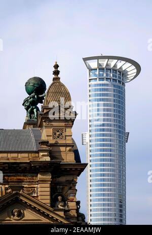 Germany, Hessen, Frankfurt, Westendtower, DZ-Bank, next to it the Frankfurt Central Station, on the roof Atlas, which carries the globe Stock Photo