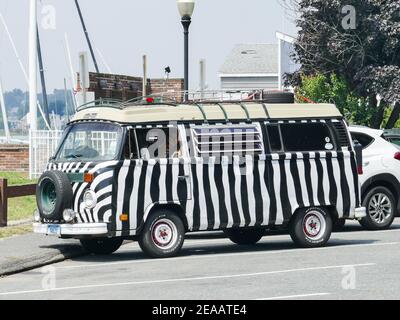 NORWALK, CT, USA -JULY 31, 2019:  Painted car like a zebra parking on beach area Stock Photo