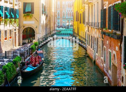 Canal in Venice between the old houses Stock Photo