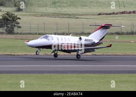 N889TF, a privately-owned Cessna 525 CitationJet M2, at Prestwick International Airport in Ayrshire, Scotland. Stock Photo