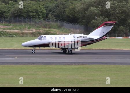 N889TF, a privately-owned Cessna 525 CitationJet M2, at Prestwick International Airport in Ayrshire, Scotland. Stock Photo
