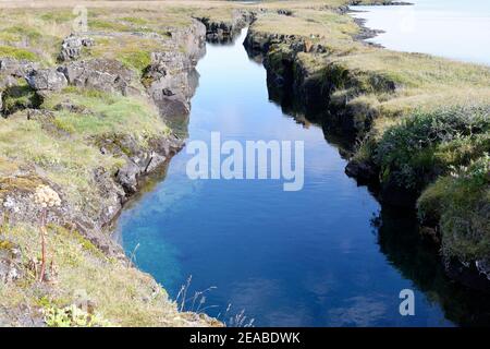 Nesgja, crystal clear freshwater fissure in Nesgja, small tectonic continental fissure between America and Eurasia, Akureyri, northern Iceland Stock Photo