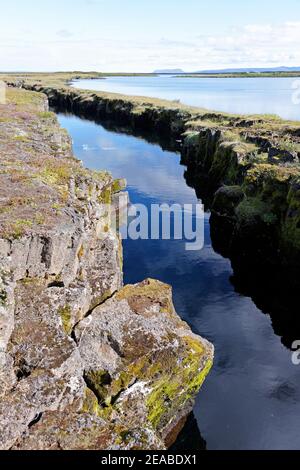 Nesgja, crystal clear freshwater fissure in Nesgja, small tectonic continental fissure between America and Eurasia, Akureyri, northern Iceland Stock Photo