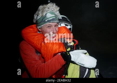 Szczyrk, Skrzyczne, Poland - February 6, 2021: Polish Cup in High Mountain Skiing Kuby Soinskiego - Night Vertical Race. Exhausted competitors at the Stock Photo
