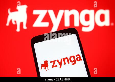 Ukraine. 08th Feb, 2021. In this photo illustration a Zynga logo of the U.S. social game developer running social video game services seen on a mobile phone and a pc screen. Credit: SOPA Images Limited/Alamy Live News Stock Photo