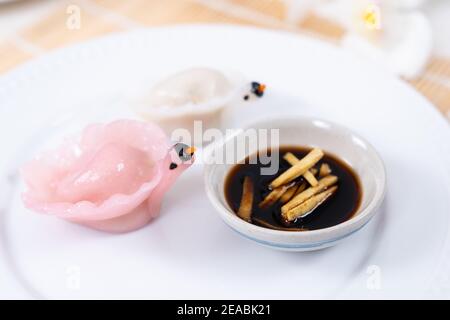 Chinese Har Gao Dim Sum dumplings in the shape of a swan Stock Photo