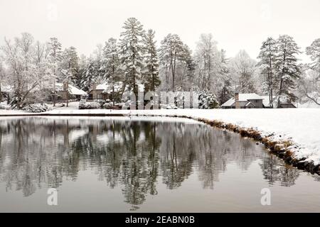 Snowy reflections on Straus Lake - Straus Park, Brevard, North Carolina, USA Stock Photo