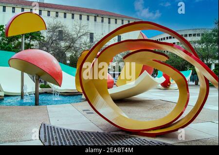 “Dropped Bowl with Scattered Slices and Peels” sculpture by Claes Oldenberg and Coosje Van Bruggen at The Stephen P. Clark Government Center in downto Stock Photo