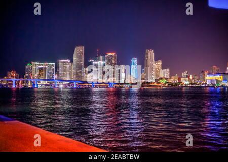 The nighttime Miami skyline seen from Watson Island on the MacArthur Causeway. Stock Photo