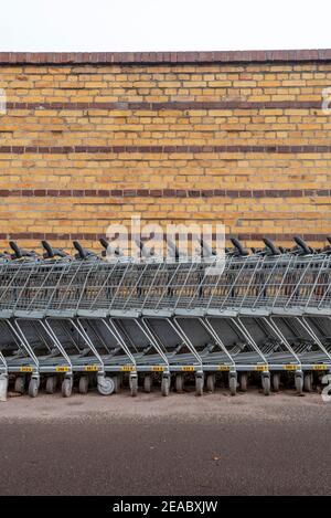 Shopping carts pushed together Stock Photo