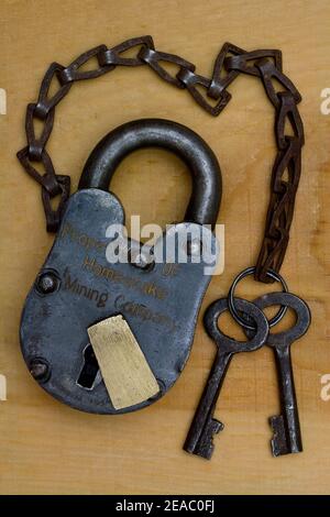 Early Style Padlock with Keys on Chain Stock Photo