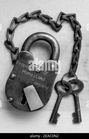 Early Style Padlock with Keys on Chain Stock Photo