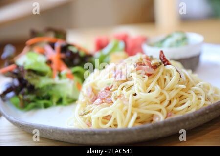 Spaghetti with mussels and ham in japanese style Stock Photo