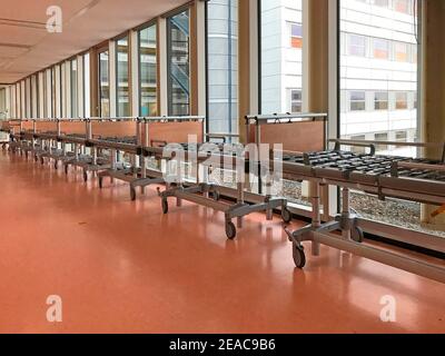 Empty hospital beds in a hospital corridor Stock Photo