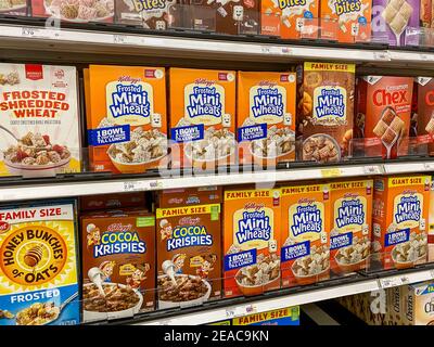 A display of Kellogg's and Post breakfast cereal is seen in a ...