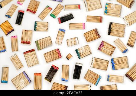 multicolored match sticks in boxes on a white background Stock Photo