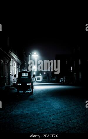 Street in a small Scandinavian town at night Stock Photo