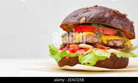 rye bun hamburger on the white background Stock Photo