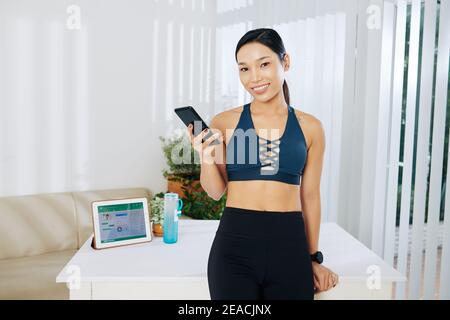 Beautiful young fit Asian woman Stock Photo