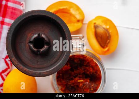 Empty hookah shaft close up on table with fresh fruit Stock Photo