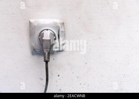Electricity short circuit Electrical failure resulting in electricity wire burntsocket cable after fire Stock Photo