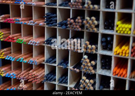 Showcase with colored pencils for drawing in the store for artists or stationery Art concept background Stock Photo