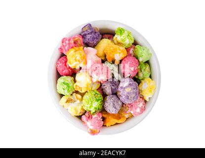 Sweet multicolor caramel Popcorn in white bowl. Studio Photo Stock Photo