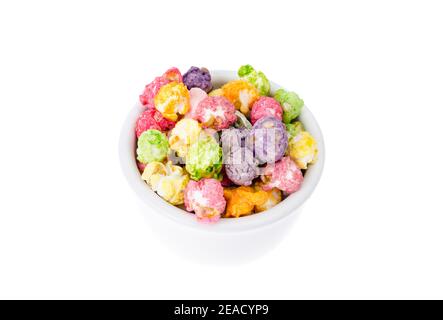 Sweet multicolor caramel Popcorn in white bowl. Studio Photo Stock Photo