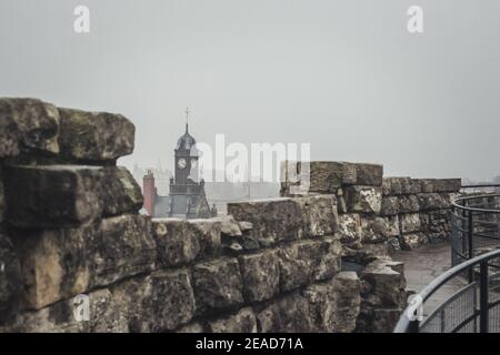 Skyline view of York from the top of Clifford's Tower during a foggy day in Winter, Yorkshire, England, UK. Stock Photo