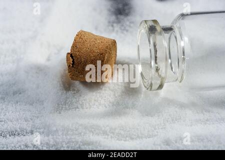 Makrogol powder photographed against a black background in the studio Stock Photo