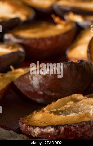 Semi-Dried plums - selective close-up focus Stock Photo