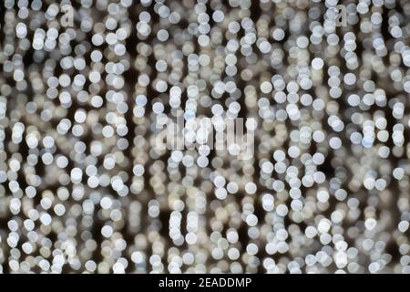 Defocused lights of christmas garlands, white bokeh light Stock Photo