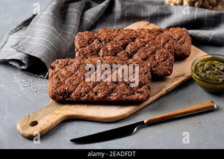 Whole grain scandinavian bread on wooden board Stock Photo
