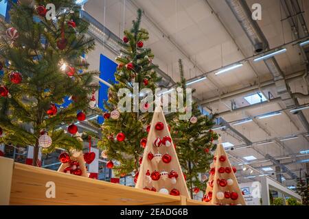 Christmas tree on shelf for sell in the store. Stock Photo