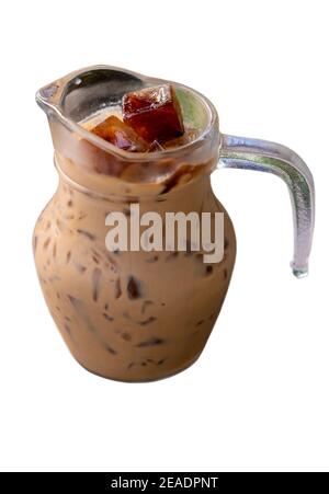 Iced latte in pitchers, isolated o white background. Stock Photo