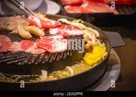 Pork BBQ style on the Korean BBQ Grill Pan. Stock Photo