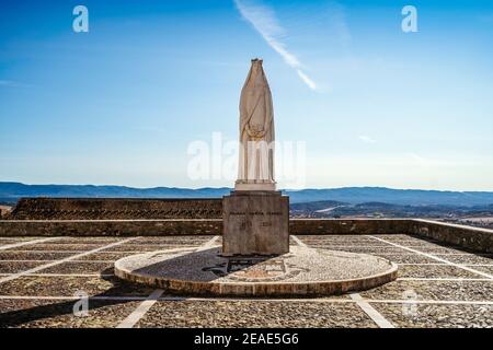 Monument of queen Saint Isabel in front of her castle in Estremoz, Portugal Stock Photo