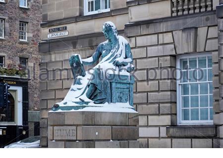 Edinburgh, Scotland, UK. 9th Feb 2021. David Hume Statue on the Royal Mile covered in snow. Credit: Craig Brown/Alamy Live News Stock Photo