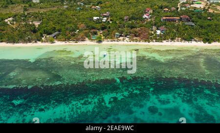 Aerial drone of coast, turquoise sea and sand beach. Panglao island, Bohol, Philippines. Stock Photo