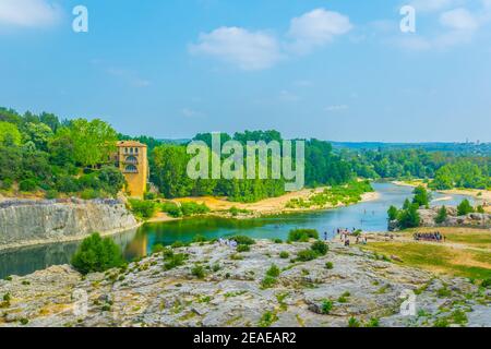 River Gardon flowing under Pont du Gard aqueduct in France Stock Photo