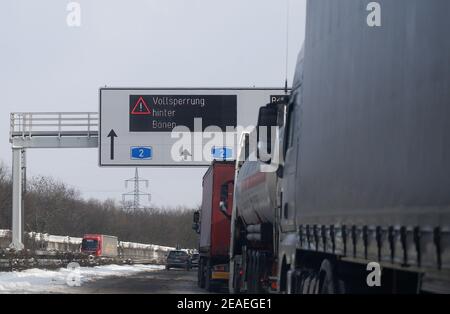 Trucks are stuck in a traffic jam after snowfall on the Autobahn A2 highway in Kamen, Germany, February 9, 2021. REUTERS/Leon Kuegeler