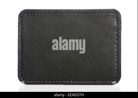 Clean black leather label tag isolated on white background Stock Photo