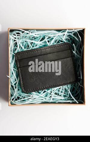 Leather wallet with pockets in box above top view isolated Stock Photo