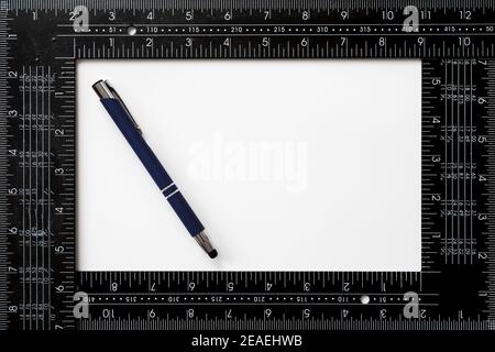 Blue pen and carpenter's square to personalize with the logo of your company over white background Stock Photo